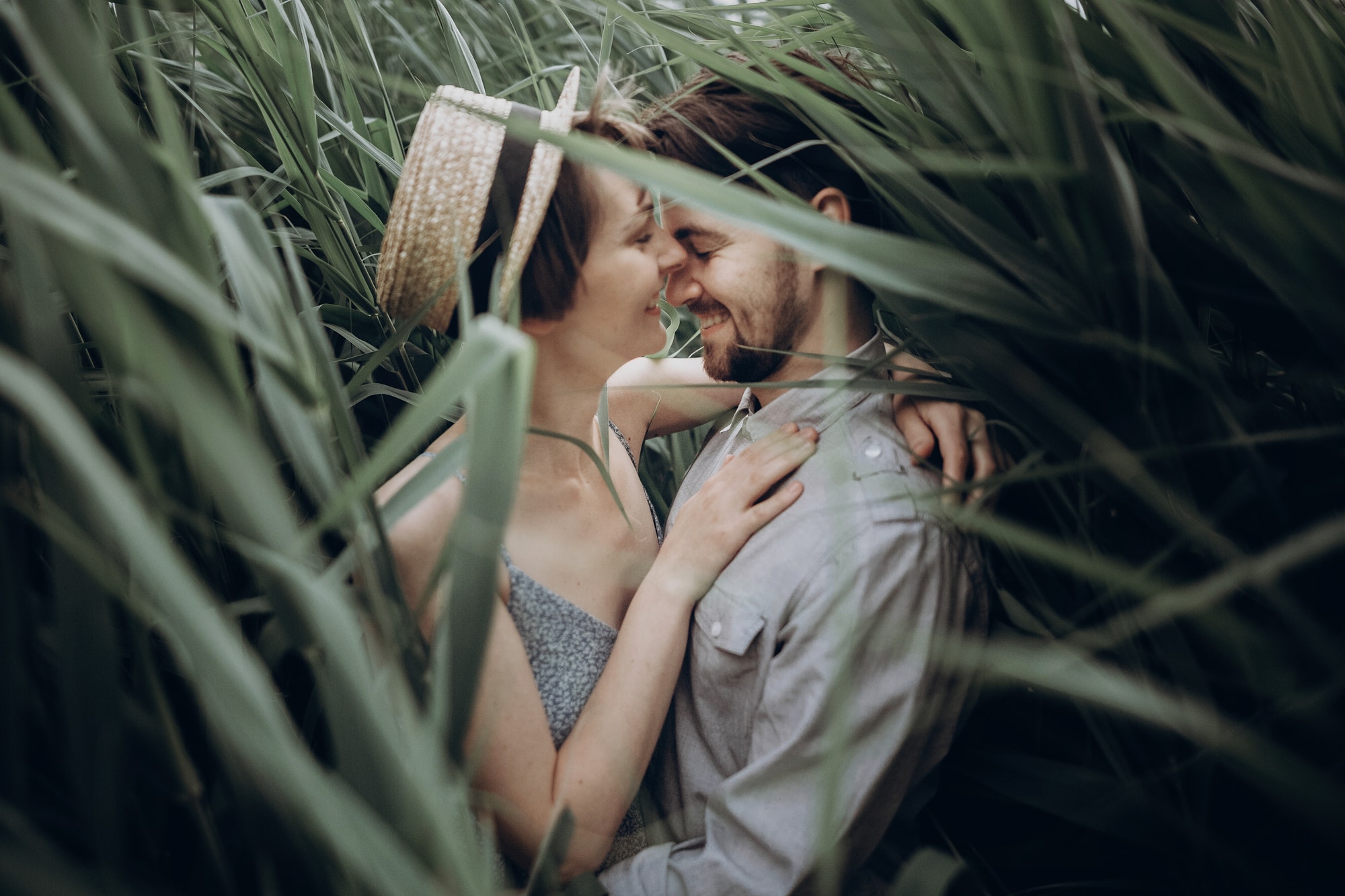 happy-hipster-couple-embracing-at-lake-in-cane-2.jpg